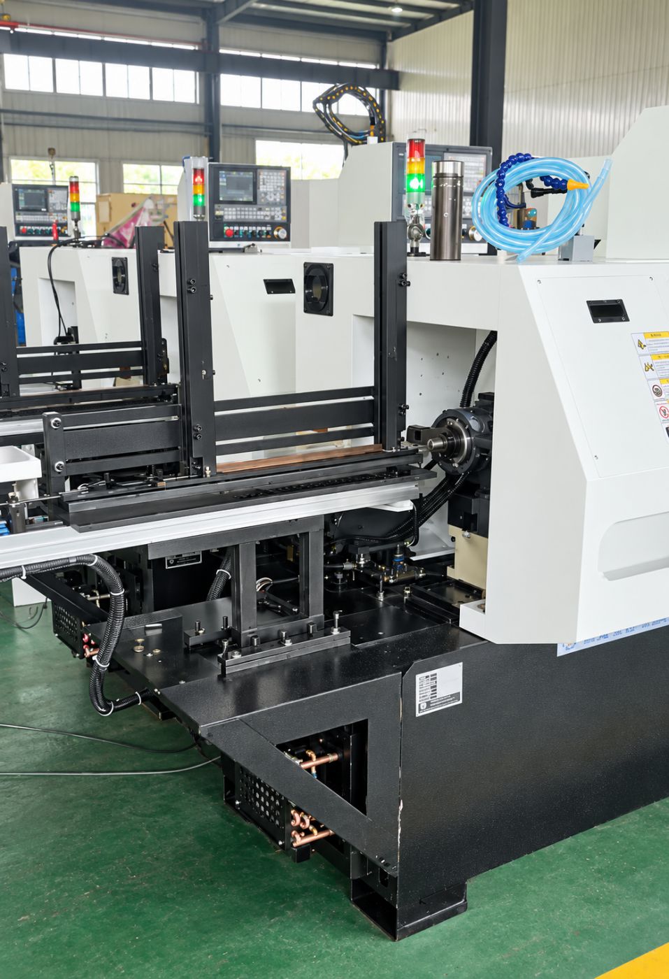 Automatic feeding CNC lathe with bar magazine